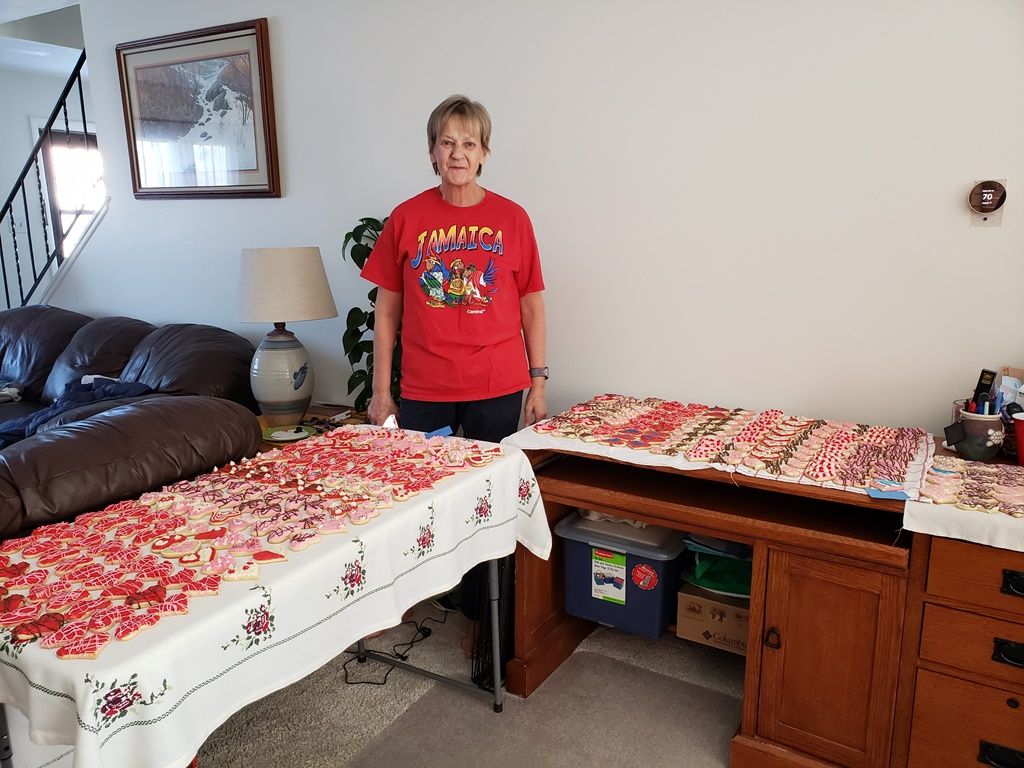 VFW Post 11453 donated $200 for cookie supplies. Karen Kent (red shirt) baked cookies for 12 hours. Mary Lee Dixon (seated) and 6 other ladies decorated the 750 treats in four hours. The cookies will be delivered to FE Warren airmen for Valentine’s Day.
Sweet!

Mary Lee Dixon
